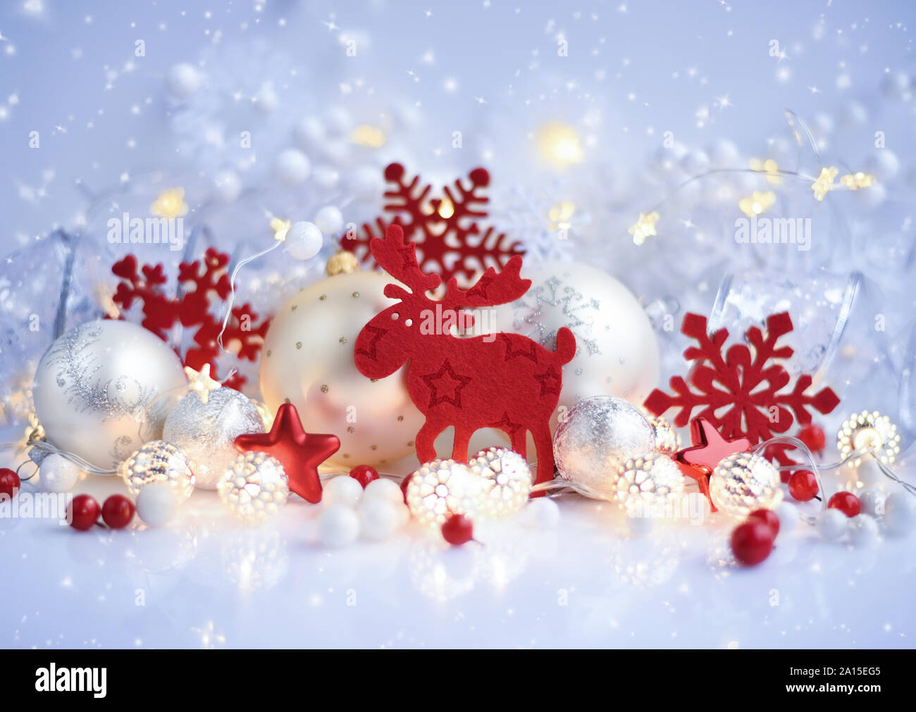 Christmas decorative elk with balls and Christmas lights. Festive Christmas background Stock