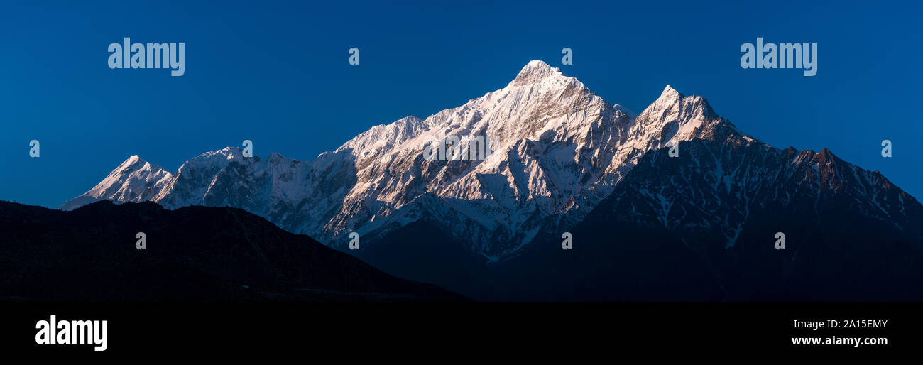 Mount Nilgiri at sunrise, Lower Mustang, Nepal Stock Photo