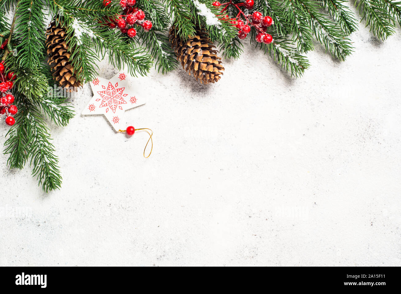 Christmas background with fir tree and decorations on white bac Stock ...