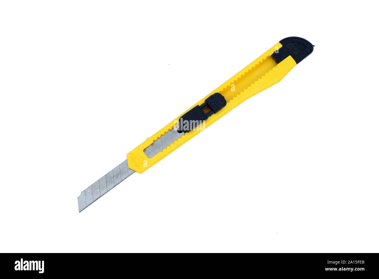 Yellow, stationery, knife cutter, isolated on white background Stock