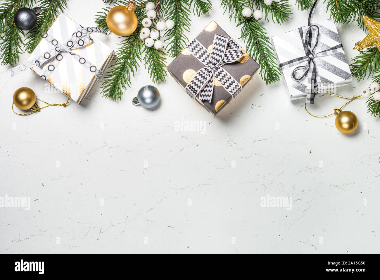 Christmas background with Gold present box and decorations Stock Photo