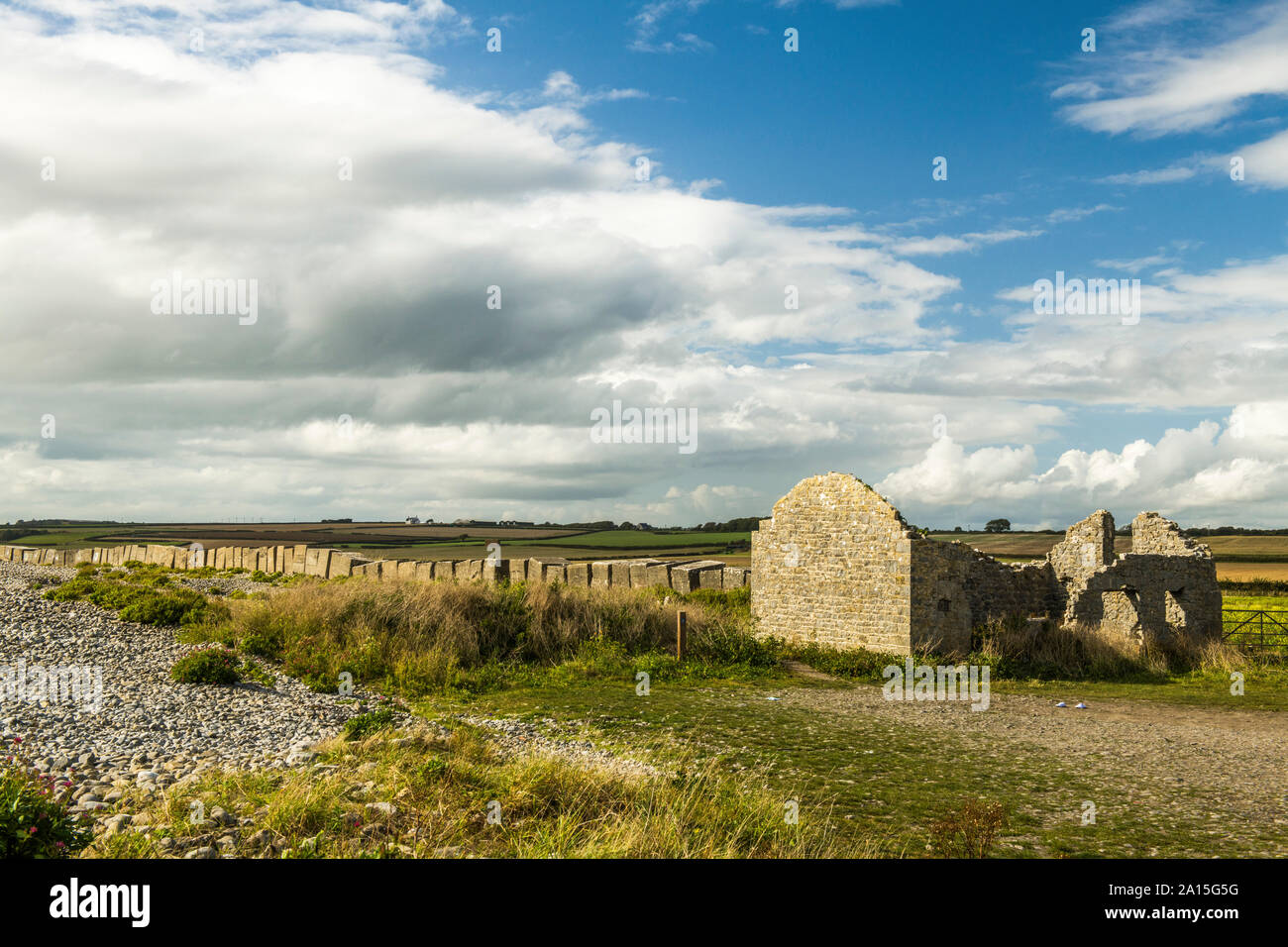 Aberthaw Coastline and ruined cottage Limpert Bay in the Vale of Glamorgan South Wales Stock Photo