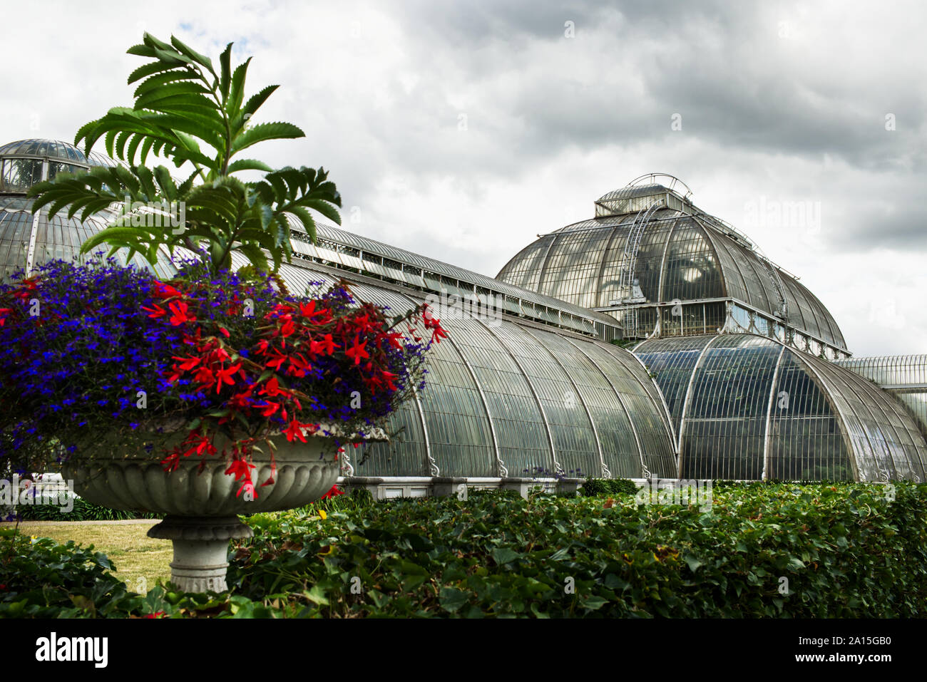 Exterior of the Palm House, a Victorian glasshouse at Kew Gardens, Richmond, London, England, UK Stock Photo