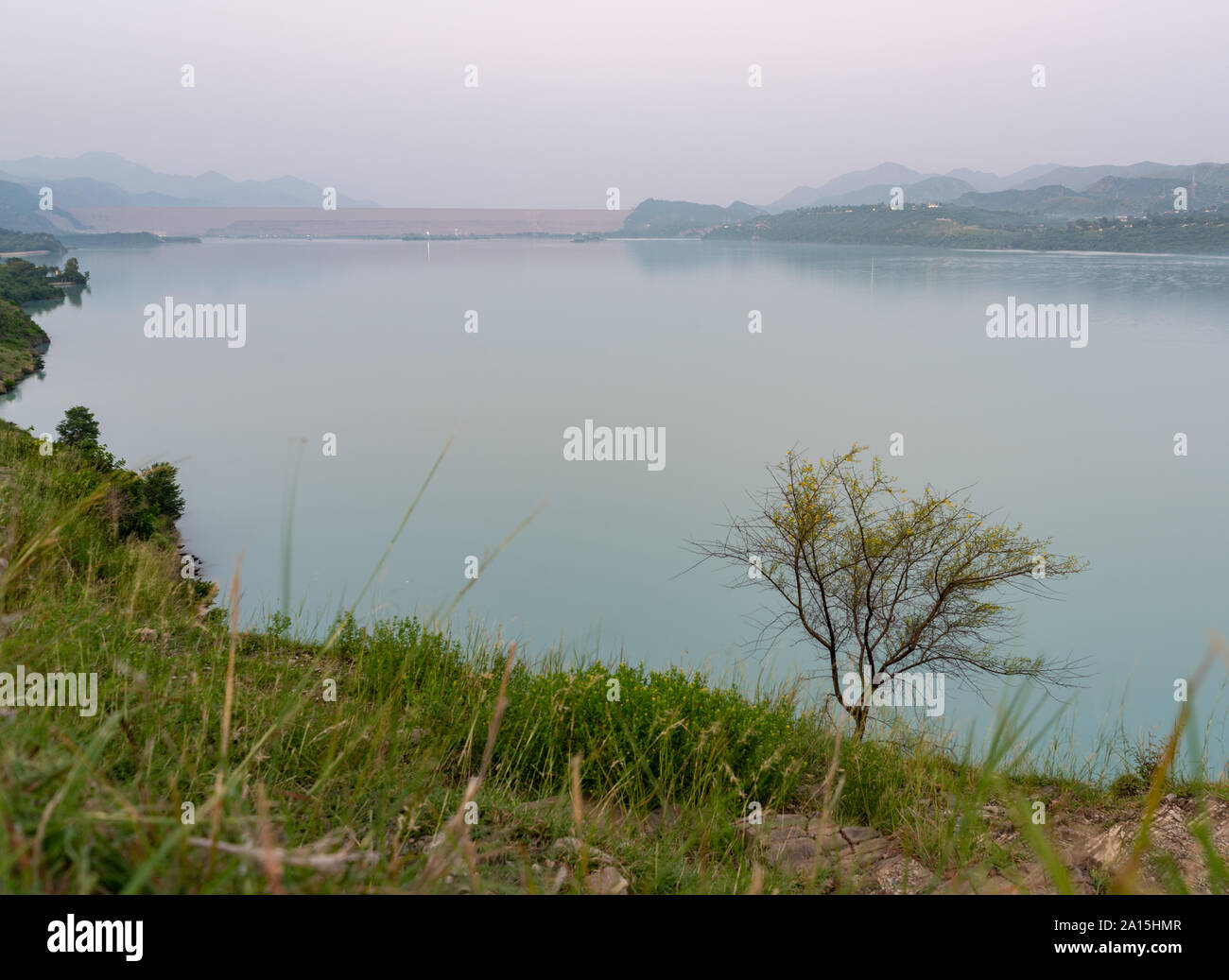 Tarbela Lake and Tarbela Dam wall from a distance Stock Photo