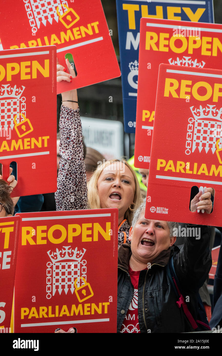 London, UK. 24th Sep 2019. Supportes of a return of Parliament hear the news and cheer - The supreme court, in Parliament Square, decides against Prime Minister Boris Johnson's decision to suspend parliament. Credit: Guy Bell/Alamy Live News Stock Photo