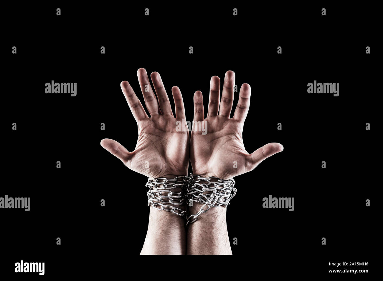 black hands breaking out of chains