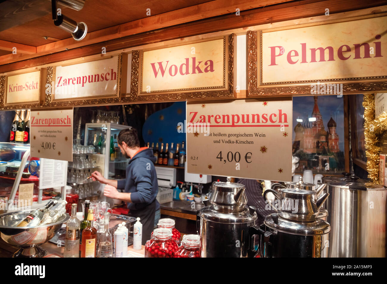 Berlin, Germany - December 12, 2018: Russian themed Christmas market stall offering Zarenpunsch (Tsar's punch), Wodka (Vodka) and Pelmeni (Russian sty Stock Photo