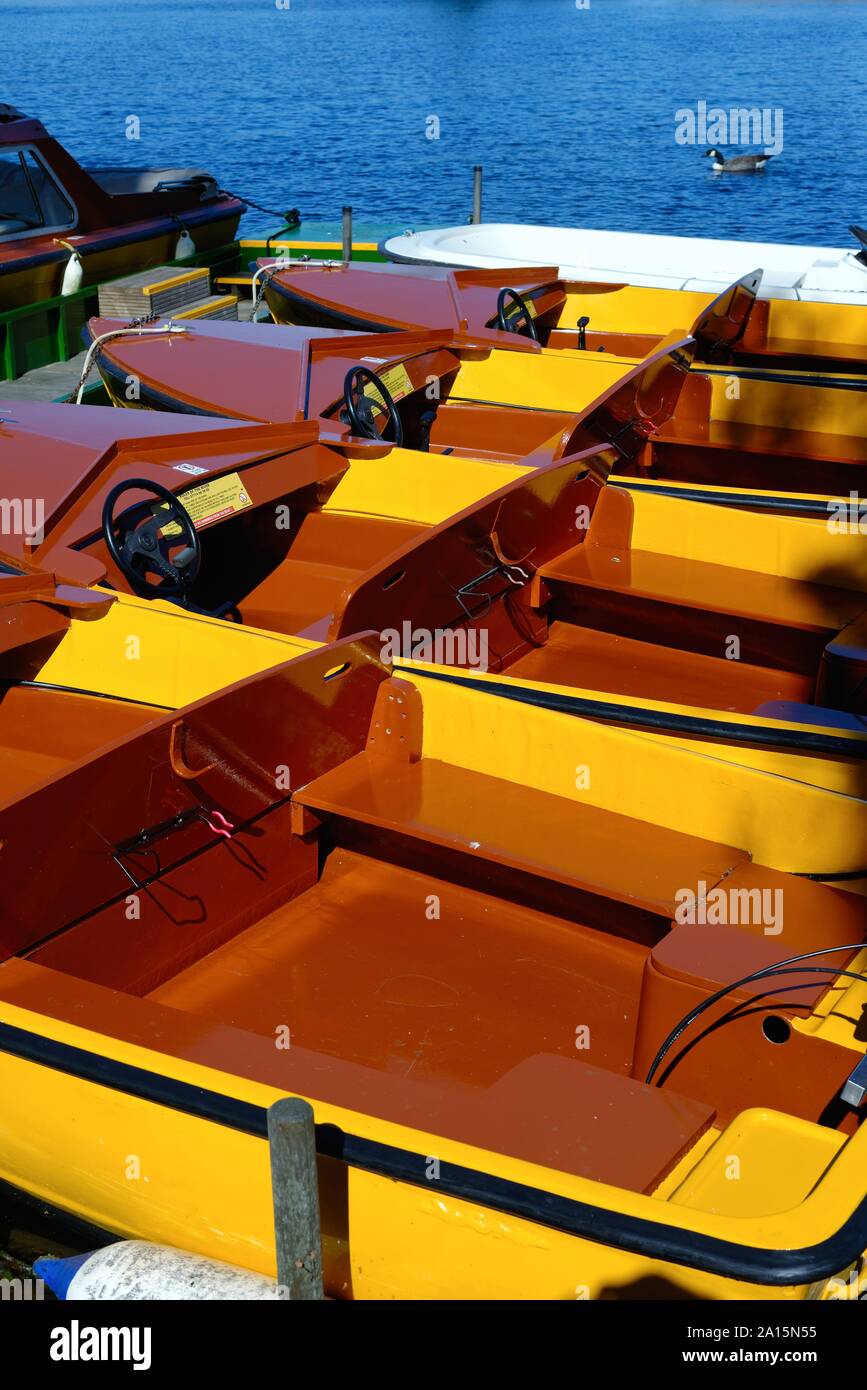 Close up of motor boats for hire by the public moored at Windsor Berkshire England UK Stock Photo