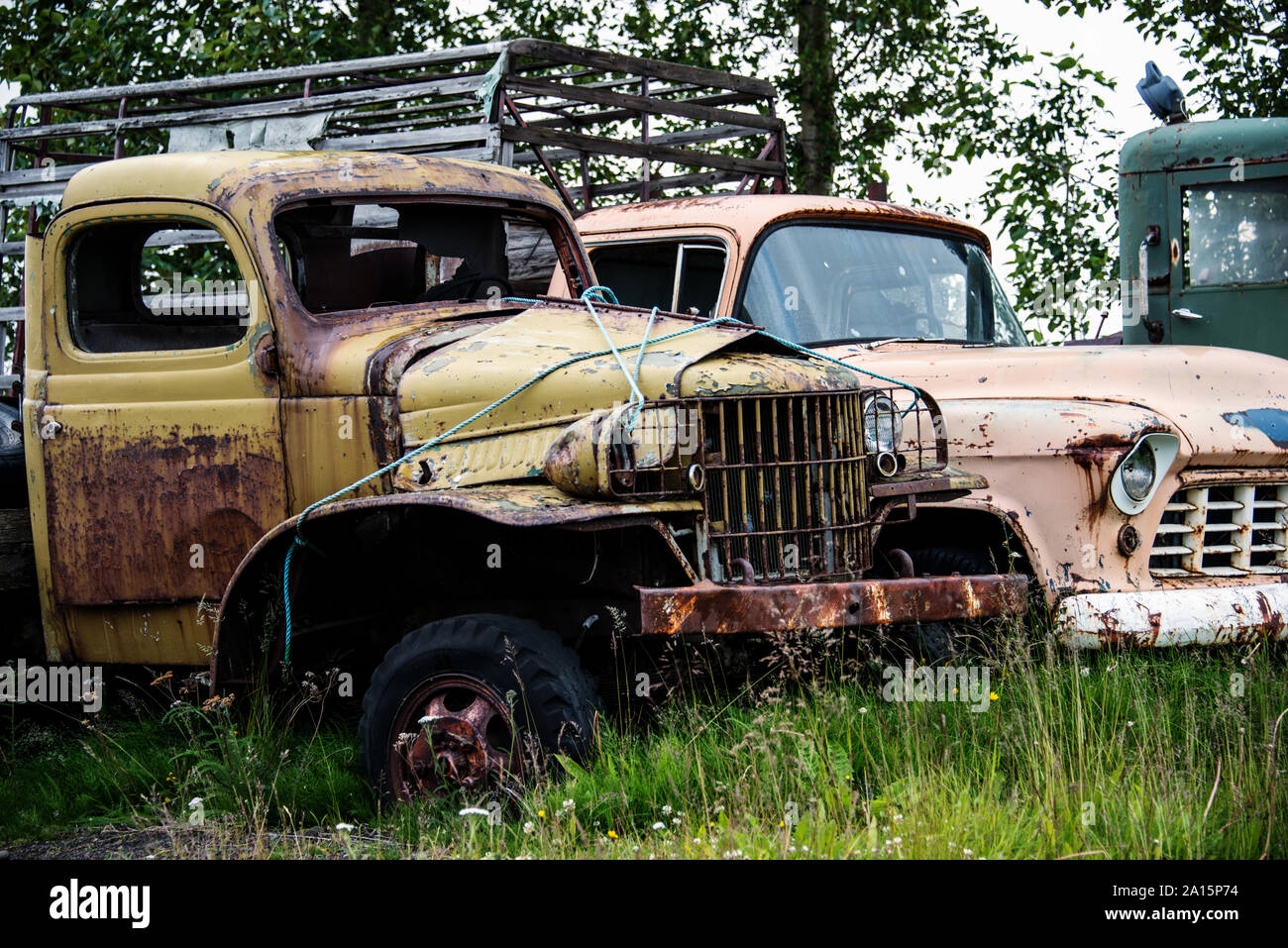 Old rustbucket discolored vehicle Stock Photo