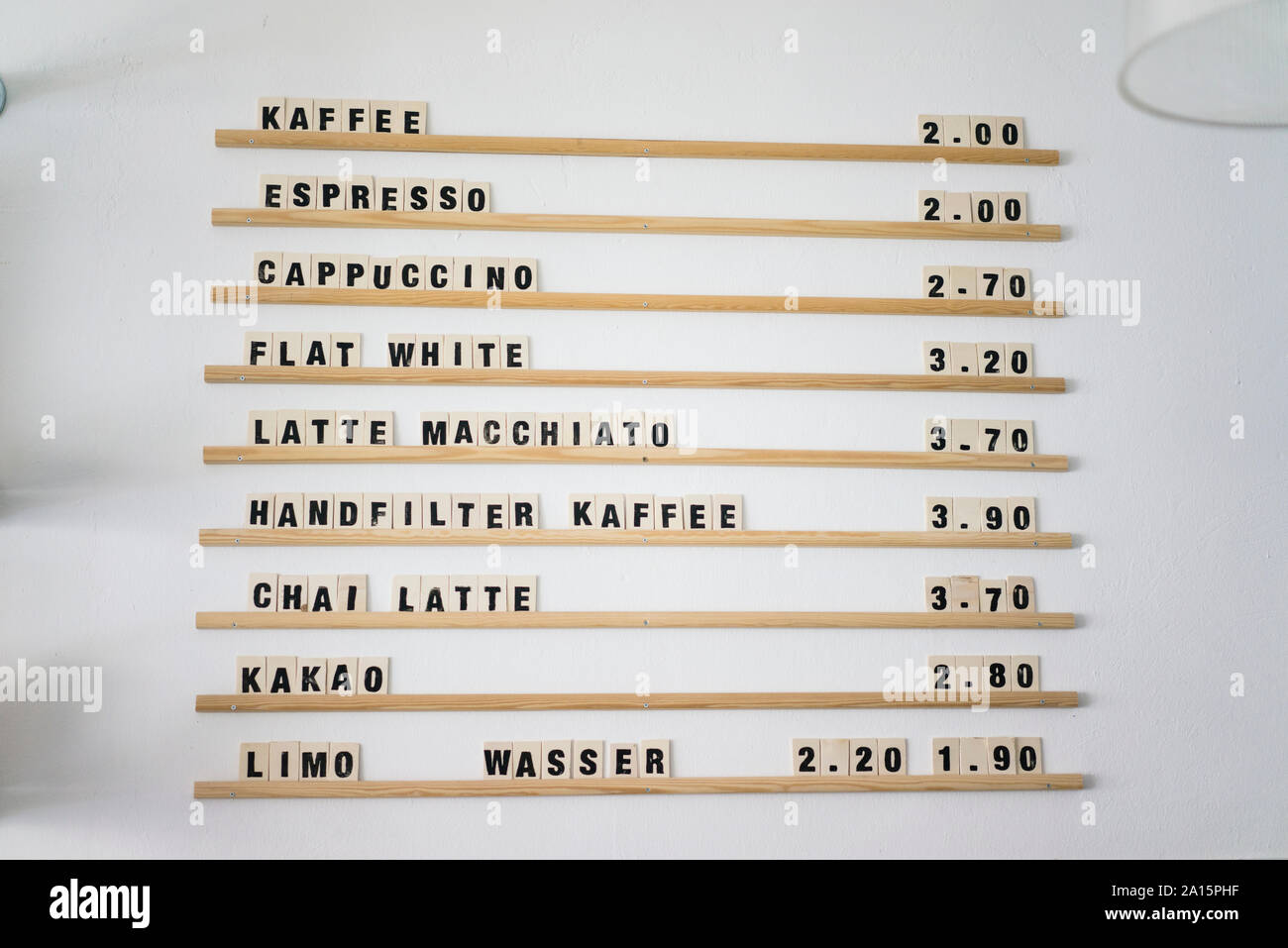 Price board for various coffees on offer in a coffee shop Stock Photo