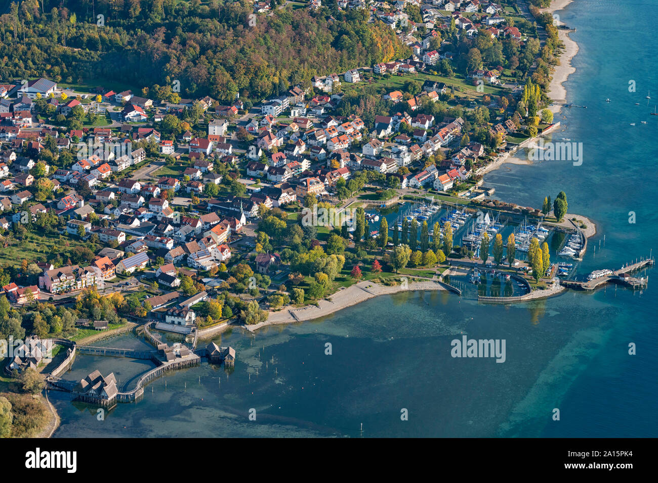 Germany, Baden-Wurttemberg, Aerial view of stilt houses and town on Lake Constance Stock Photo