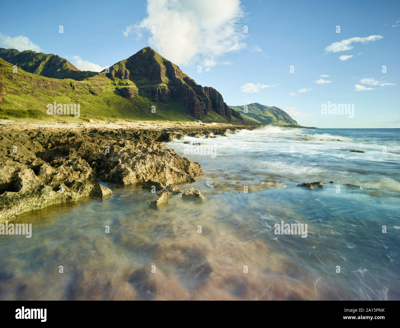 Scenic view of beach in Ka'ena Point State Park against sky Stock Photo