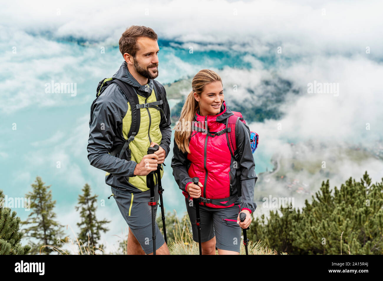 Confident active female hiking in hi-res stock photography and images ...