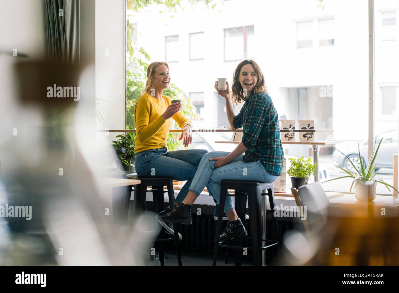 Two women in cafe having a drink hi-res stock photography and images ...