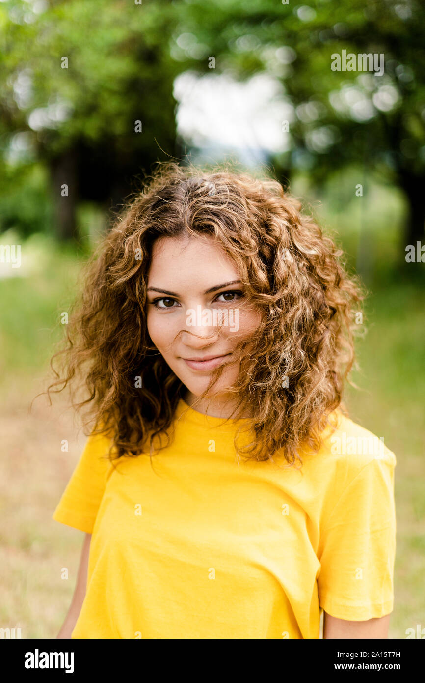 Woman smiling park eyes to camera hi-res stock photography and images ...