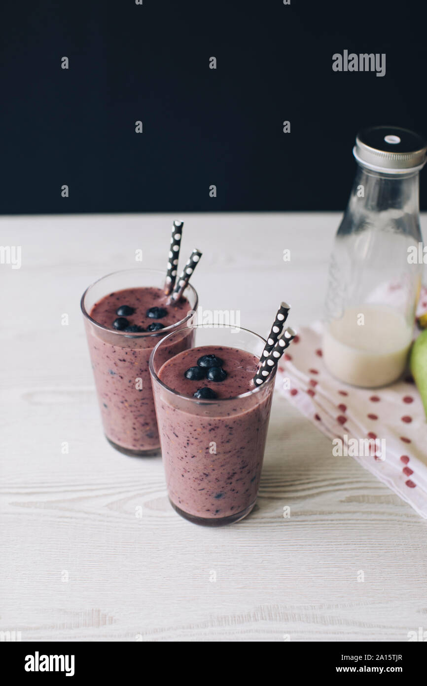 Wild berry smoothies in glasses Stock Photo