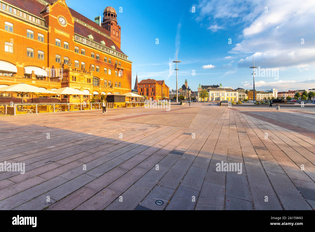 Buildings at city square by harbor in Malmo against sky Stock Photo