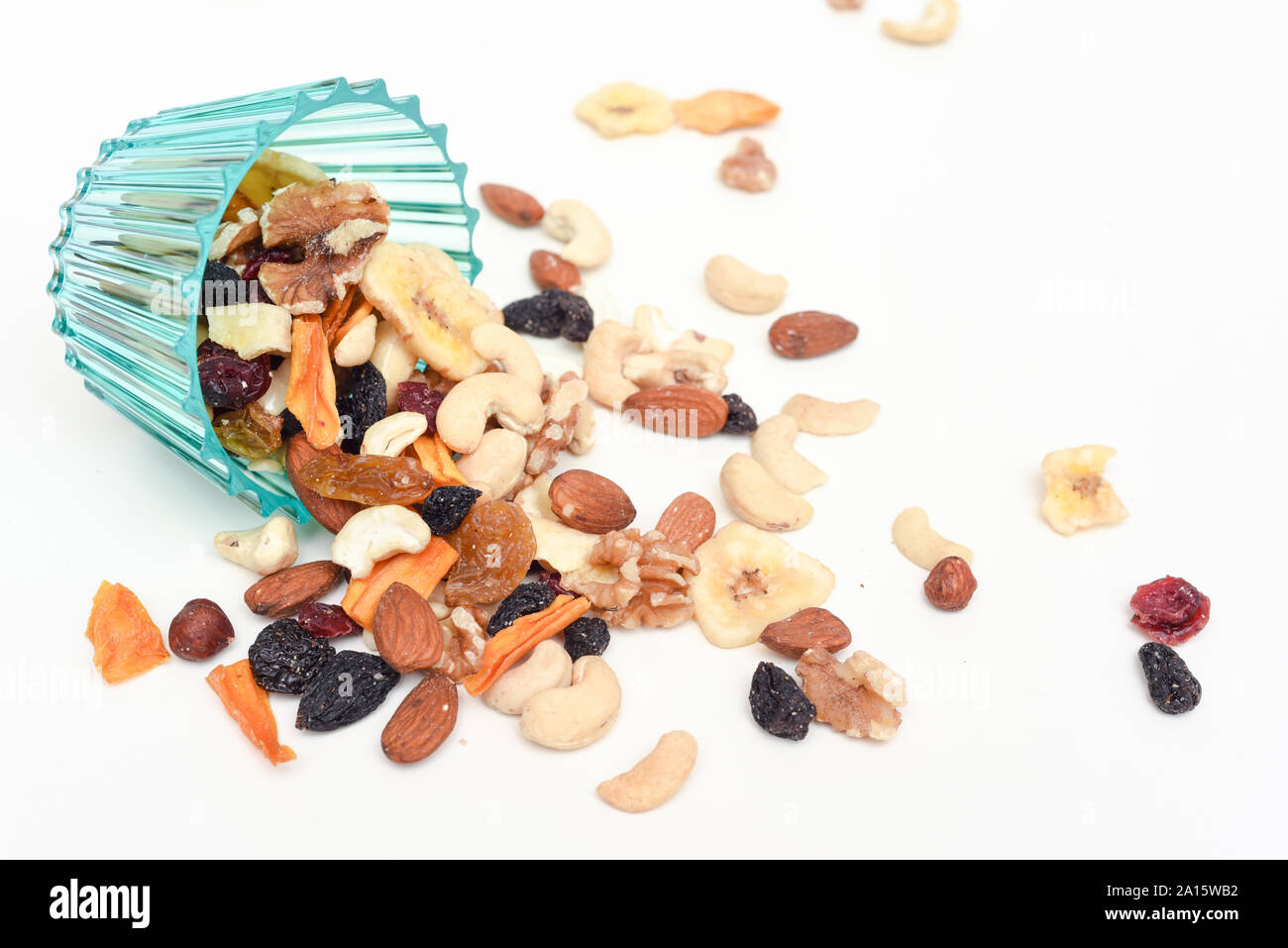 Healthy snack food trail mix of mixed nuts and dried fruits Stock Photo