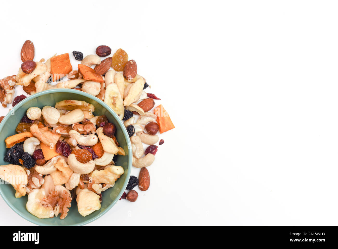 Healthy snack food trail mix of mixed nuts and dried fruits Stock Photo