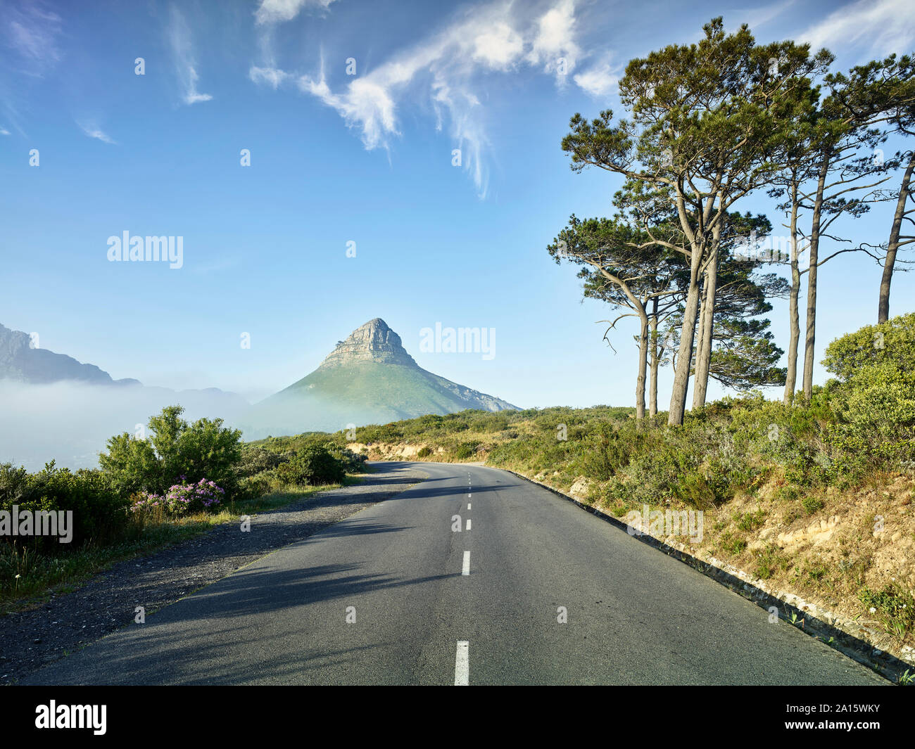 Empty asphalt road toward Lions Head mountain, Cape Town, South Africa Stock Photo