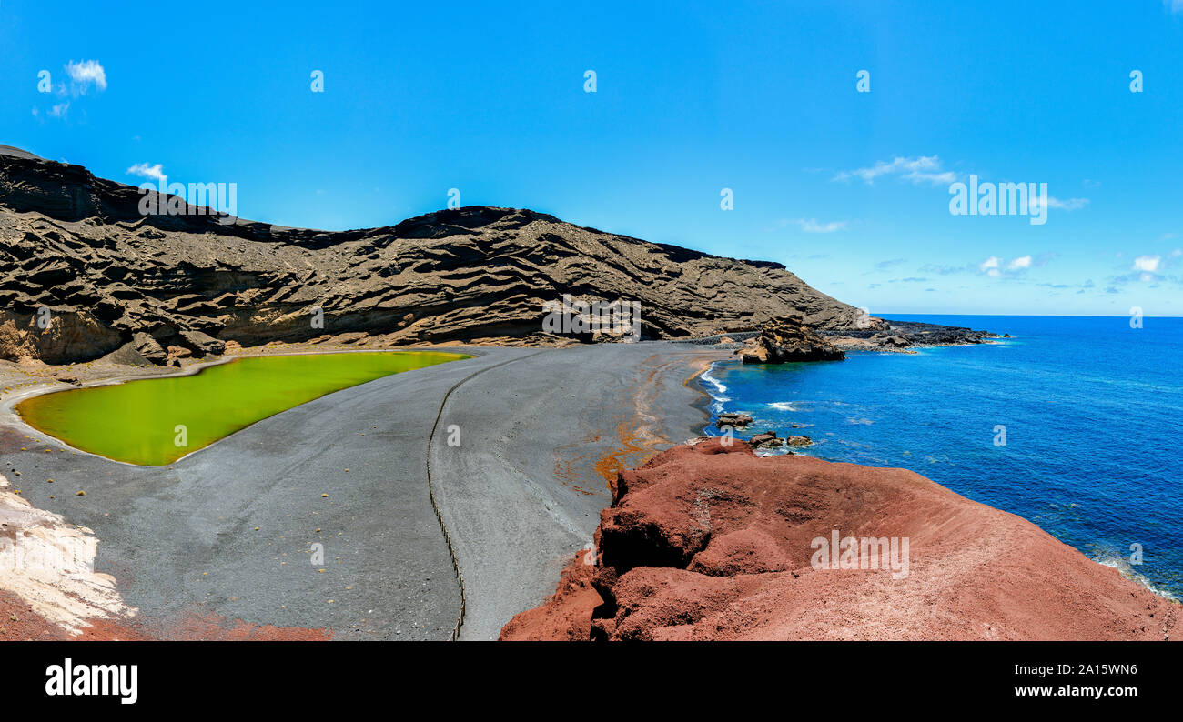 Panoramic view of the Charco de los Clicos or Lago Verde and El Golfo beach, Lanzarote, Canary Islands, Spain Stock Photo
