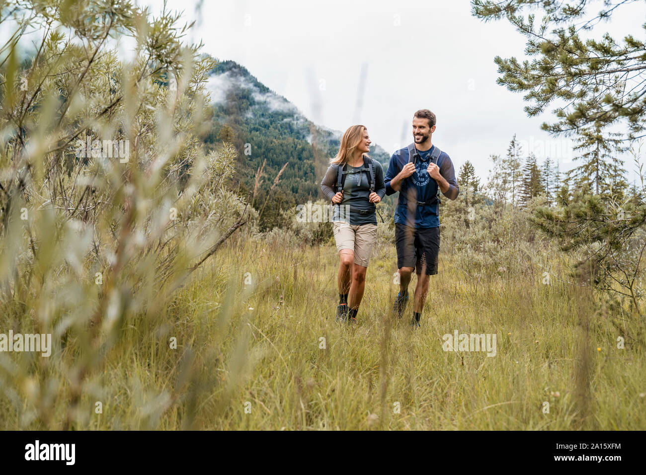 Young couple on a hiking trip, Vorderriss, Bavaria, Germany Stock Photo