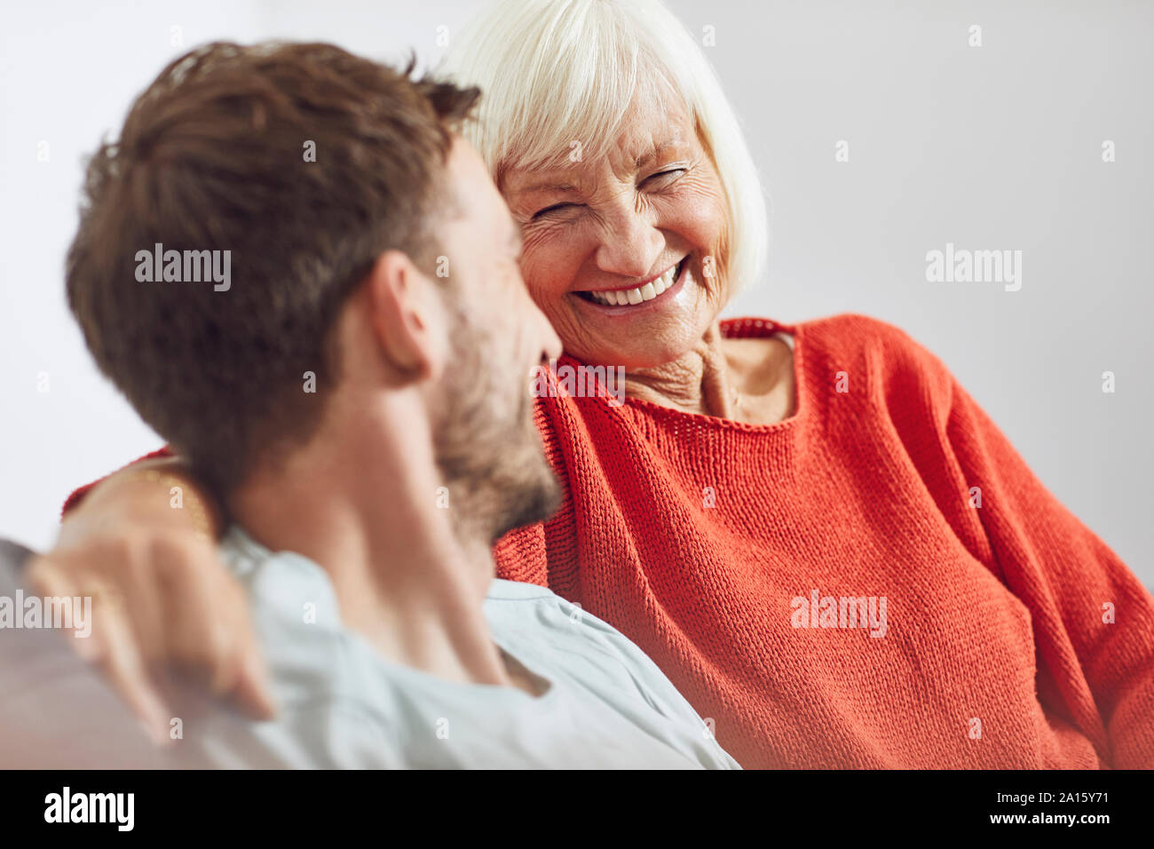 Portrait of senior woman with her grown-up grandson Stock Photo