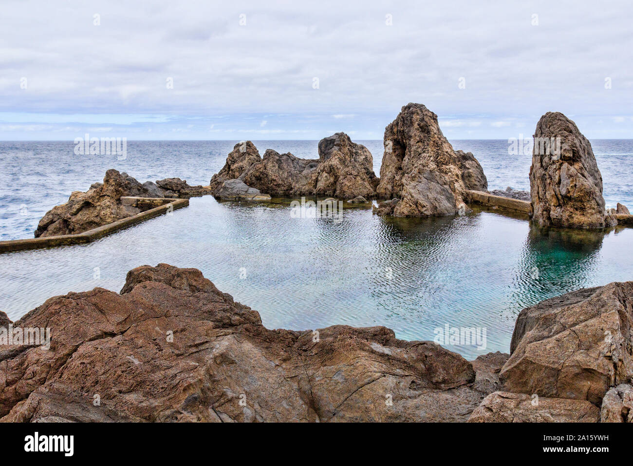 Natural swimming pool of volcanic lava in Porto Moniz on the north coast of Madeira island, Portugal Stock Photo
