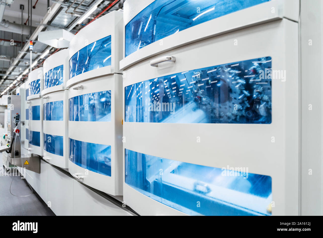 Industrial machinery with blue transparent panels, Stuttgart, Germany Stock Photo