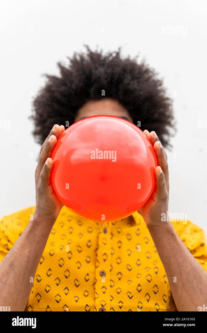 Young man wearing yellow shirt Stock Photo