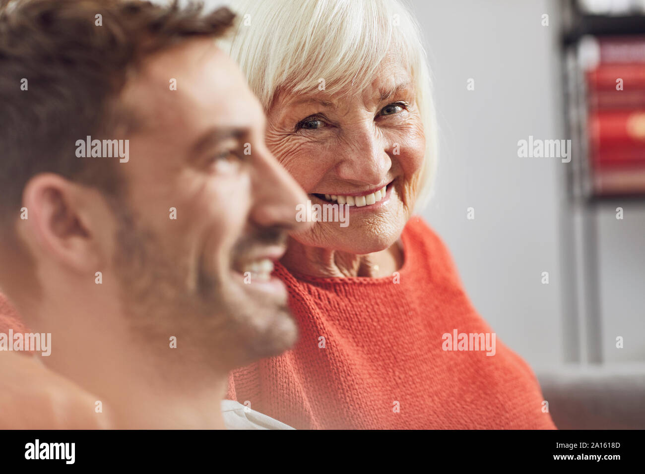 Portrait of senior woman with her grown-up grandson Stock Photo