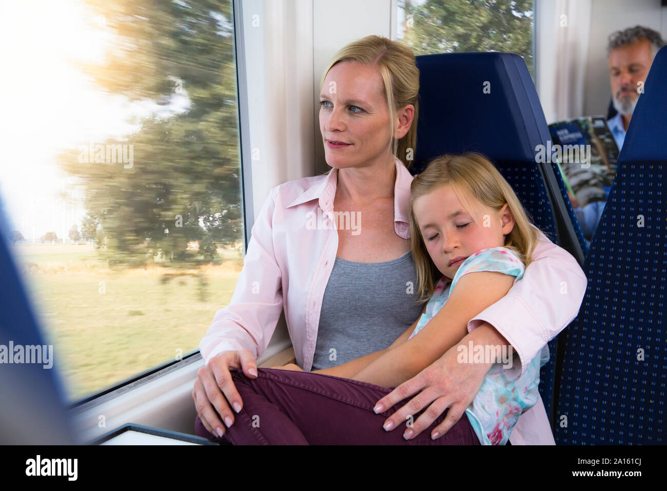 Child sitting in mothers lap hi-res stock photography and images - Alamy