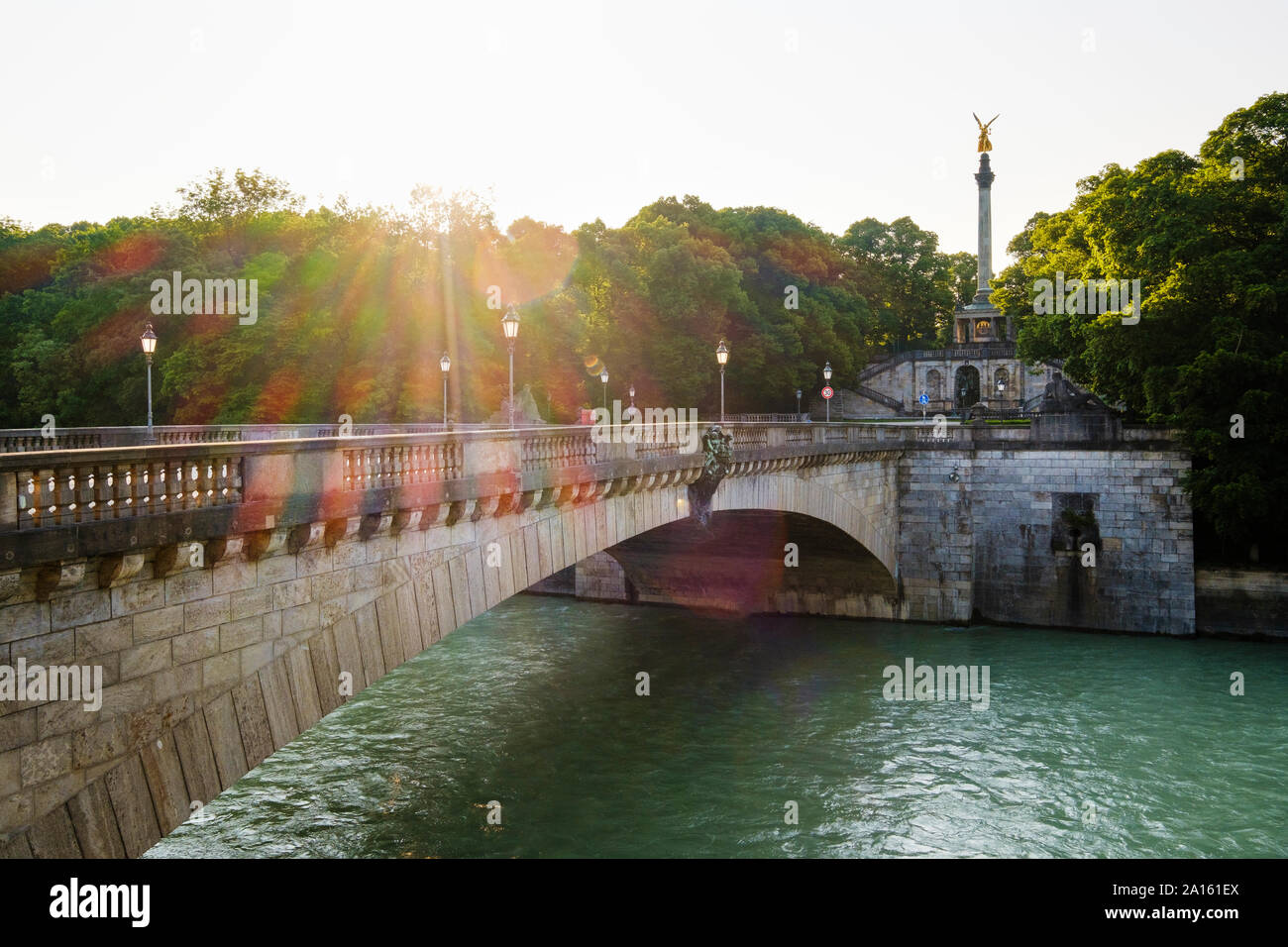 Germany, Upper Bavaria, Munich, Luitpoldbrucke crossing Isar river with Angel of Peace in background Stock Photo