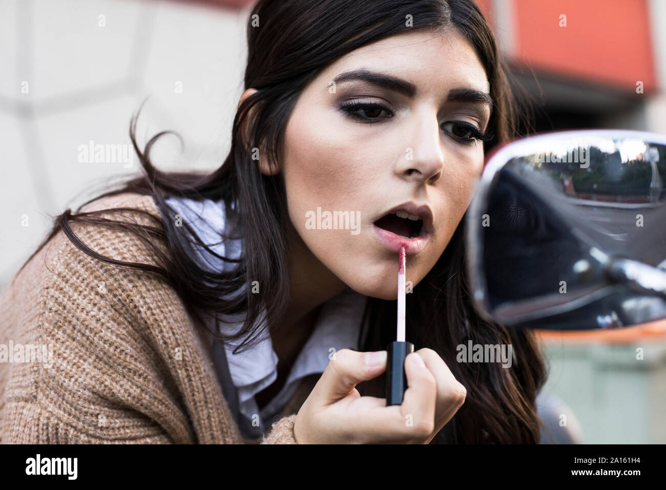 Red hair lipstick make up applying hires stock photography and images Alamy