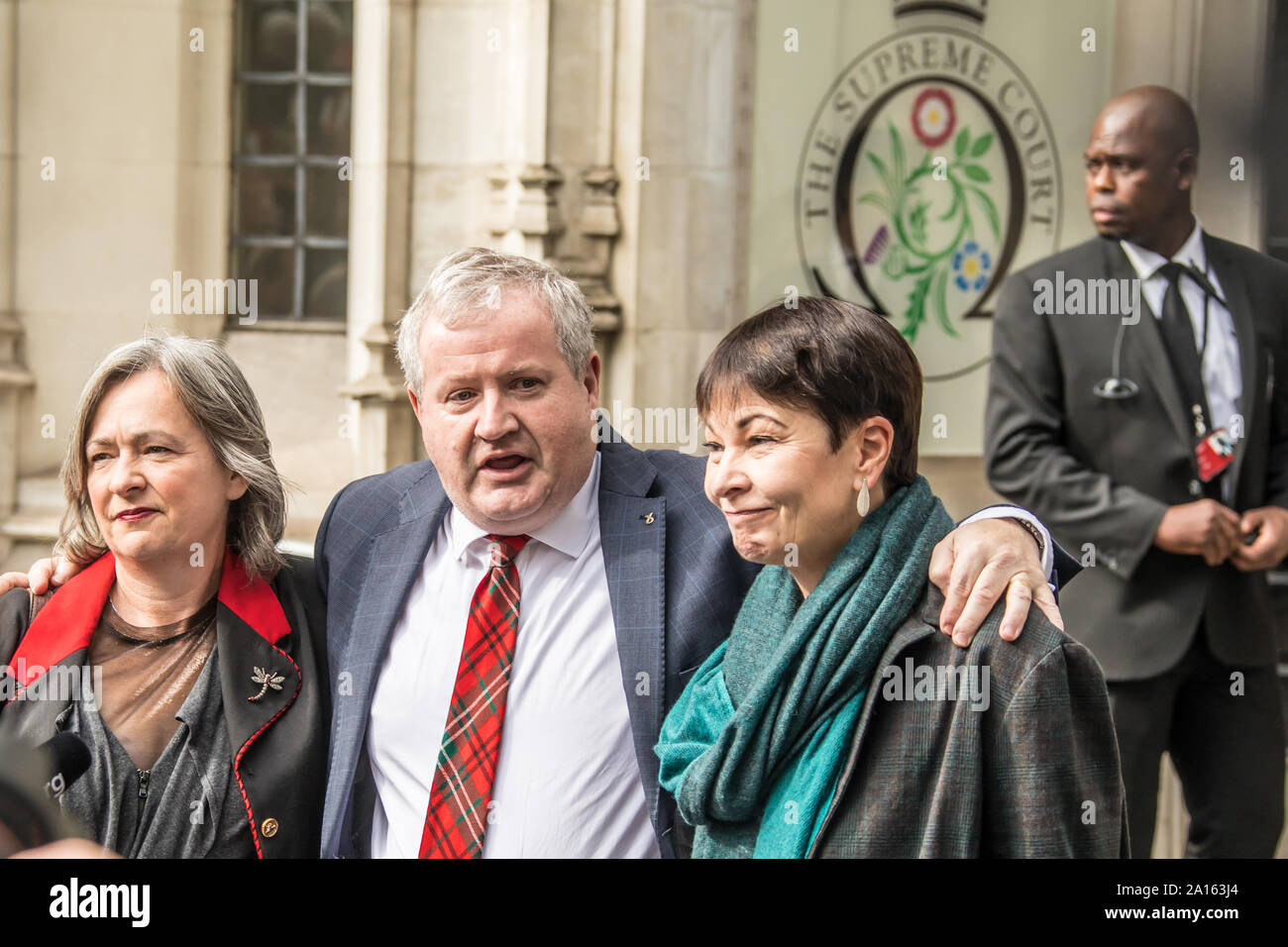 London, UK. 24th Sep, 2019. Plaid Cymru MP Liz Saville-Roberts (L) Scottish National Party leader in the House of Commons Ian Blackford (C) and Green Party MP Caroline Lucas outside The Supreme Court after the ruling that the Boris Johnson's Government acted unlawful in their proroguation of Parliament. Credit: David Rowe/Alamy Live News Stock Photo