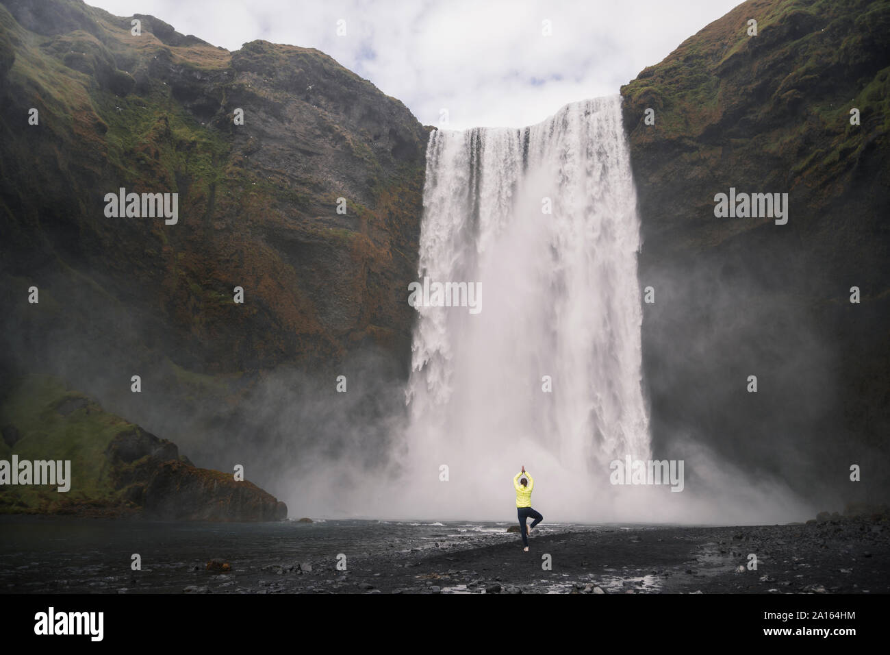 Woman yoga in front waterfall hi-res stock photography and images - Alamy