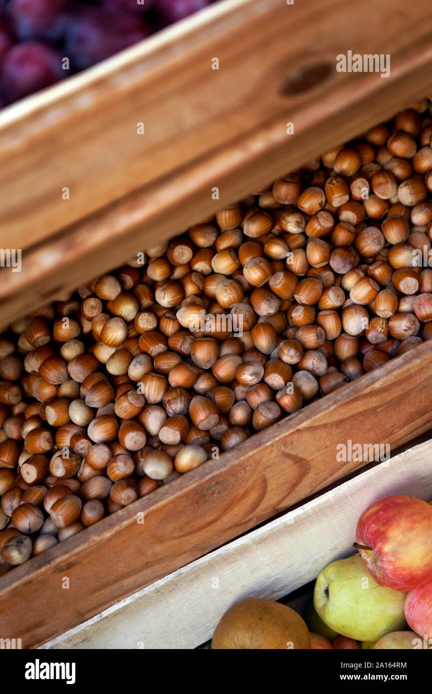 Hazelnut and fruits on a grocery stall Stock Photo Alamy