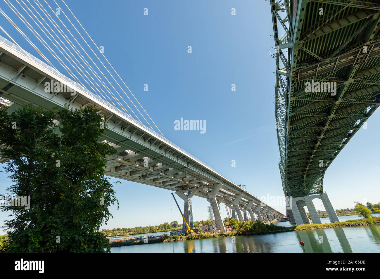 Montreal, Canada - 19 September 2019: New Champlain bridge next to Old Champlain Bridge. Stock Photo