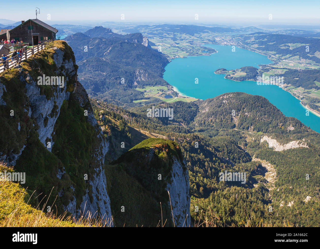 Himmelspforte Schafberg on mountain peak with lake on sunny day Stock Photo
