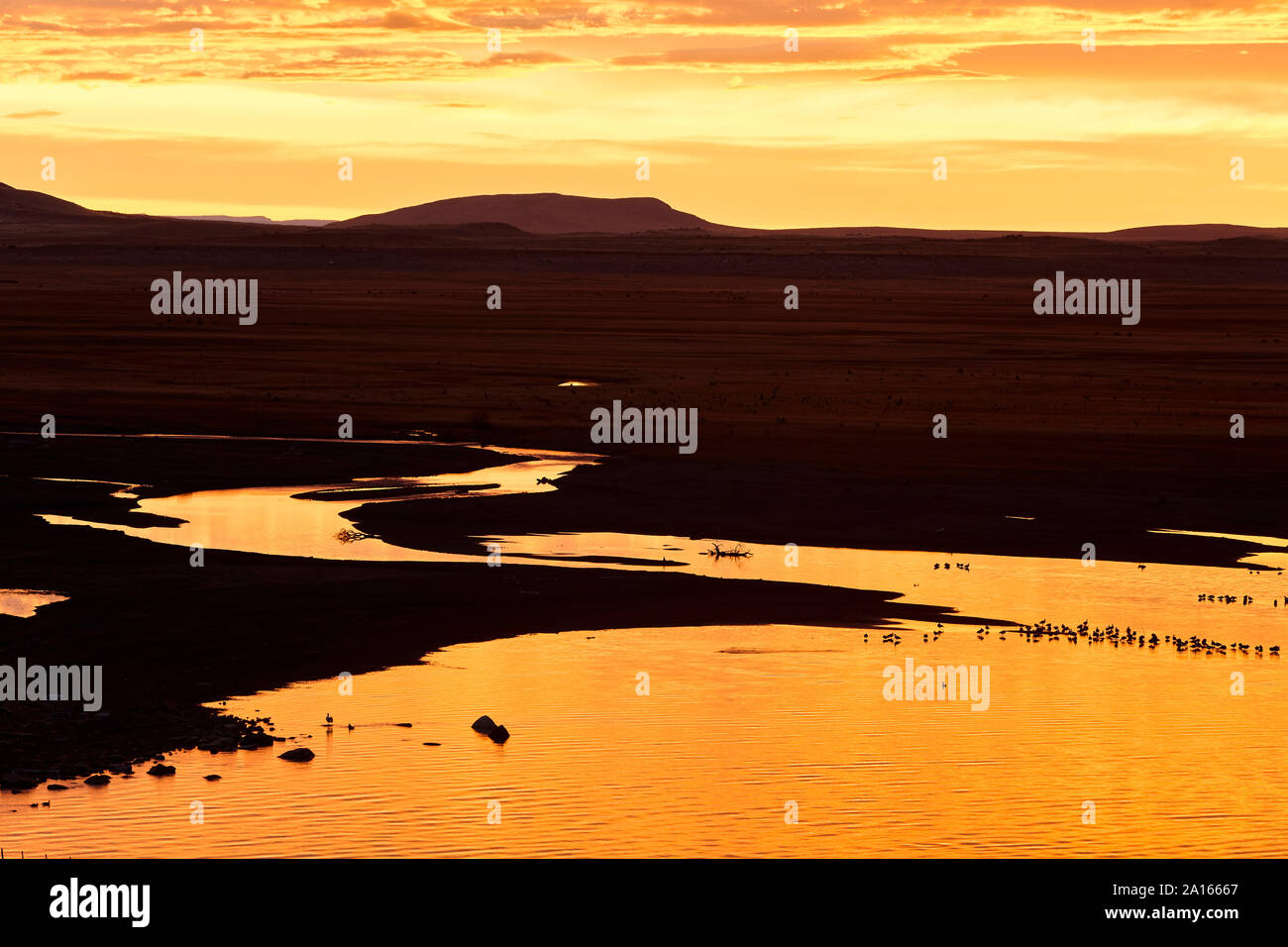 Silhouette of Magellan Penisnula at sunset, Los Glaciares National Park, Patagonia, Argentina Stock Photo