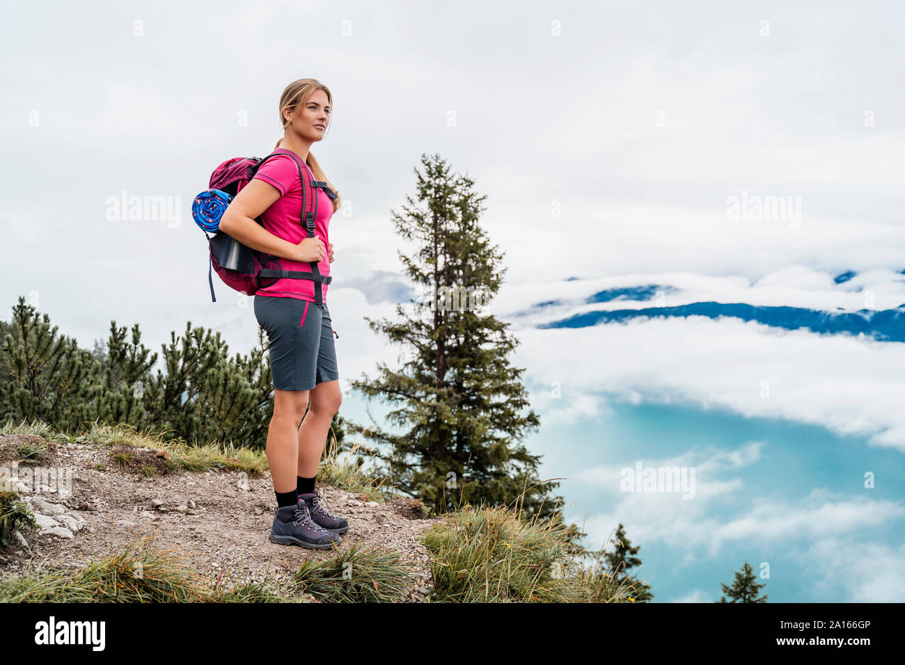 Young woman hiking in nature hi-res stock photography and images - Alamy