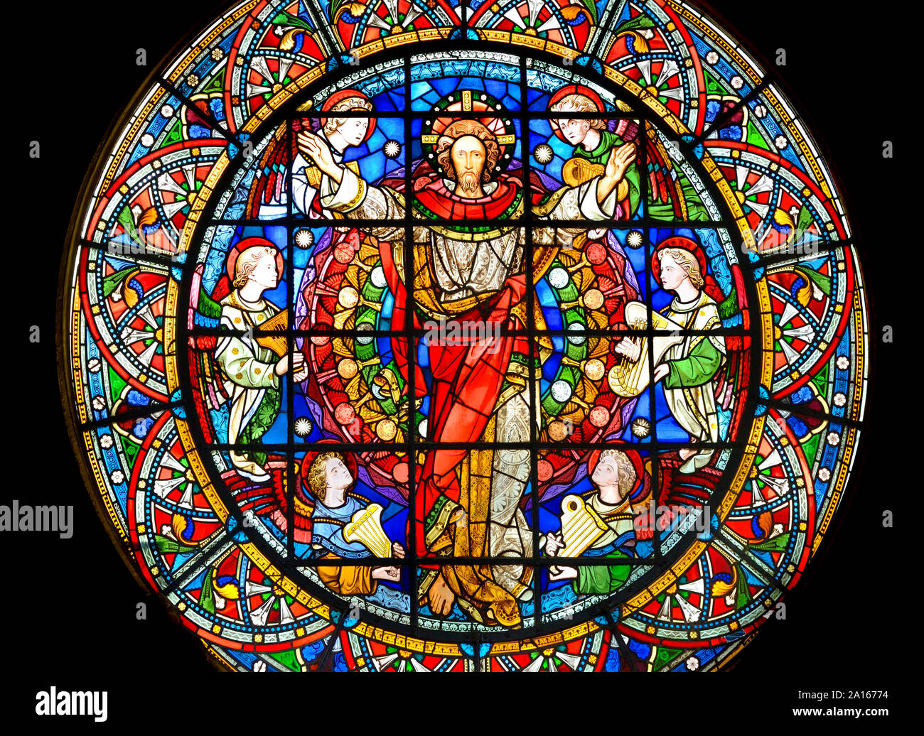 London, England UK. Church of St Michael, Cornhill. Stained glass window: Christ In Majesty (Clayton and Bell; 1859) Stock Photo