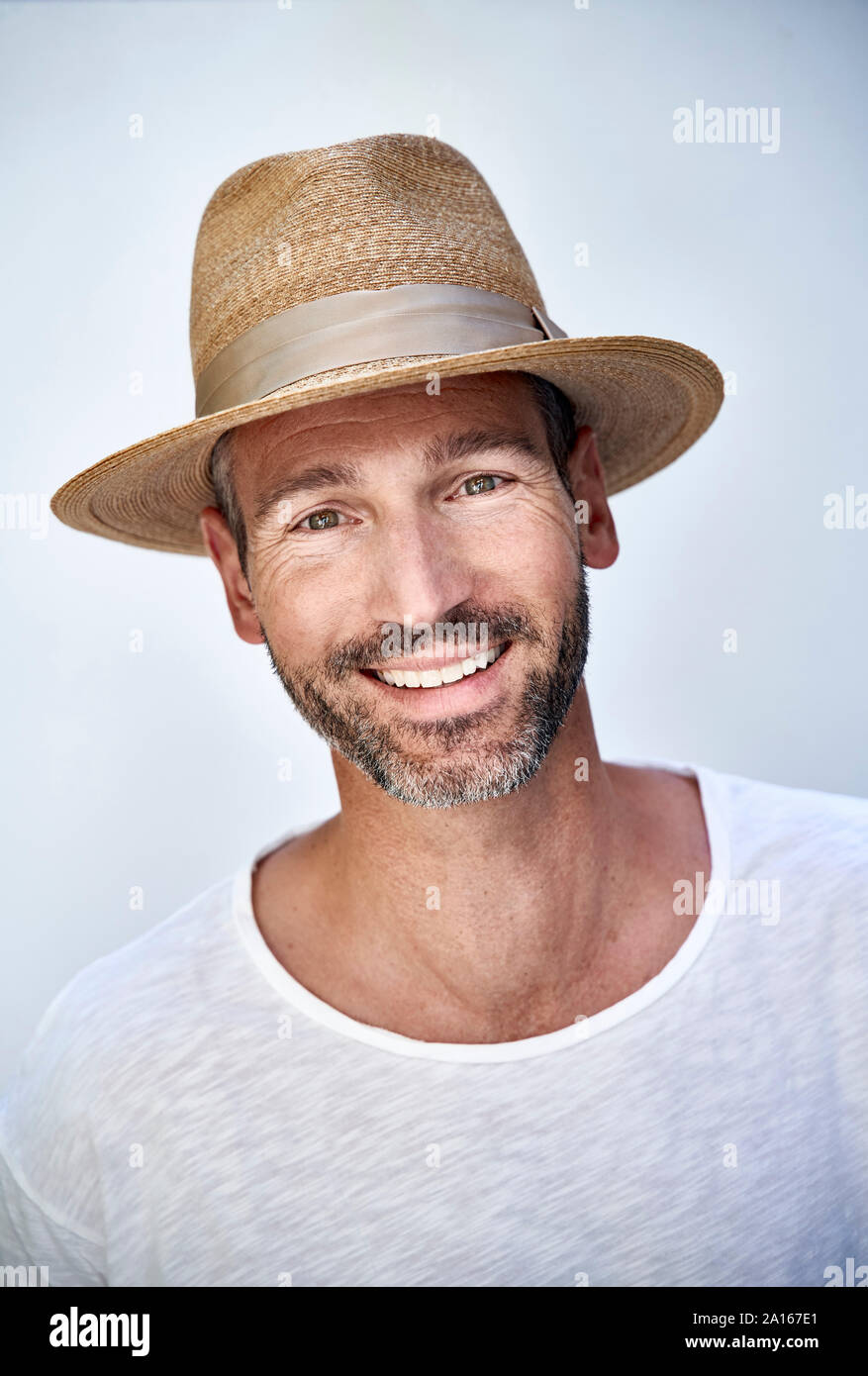 portrait of a man with straw hat Stock Photo - Alamy