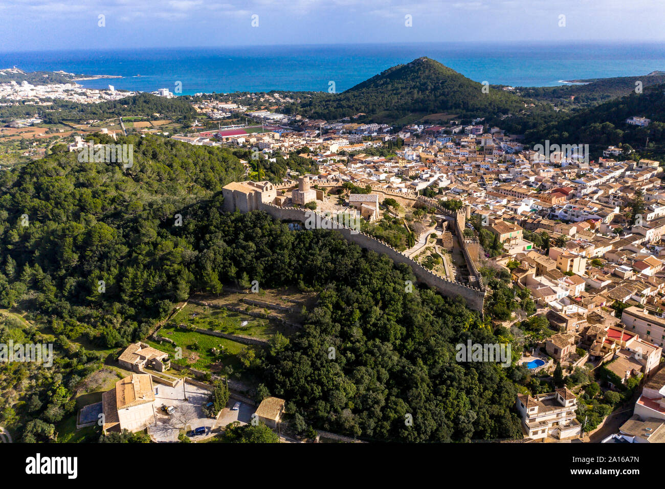 Aerial view of Castle Of Capdepera in village by Mediterranean Sea Stock Photo