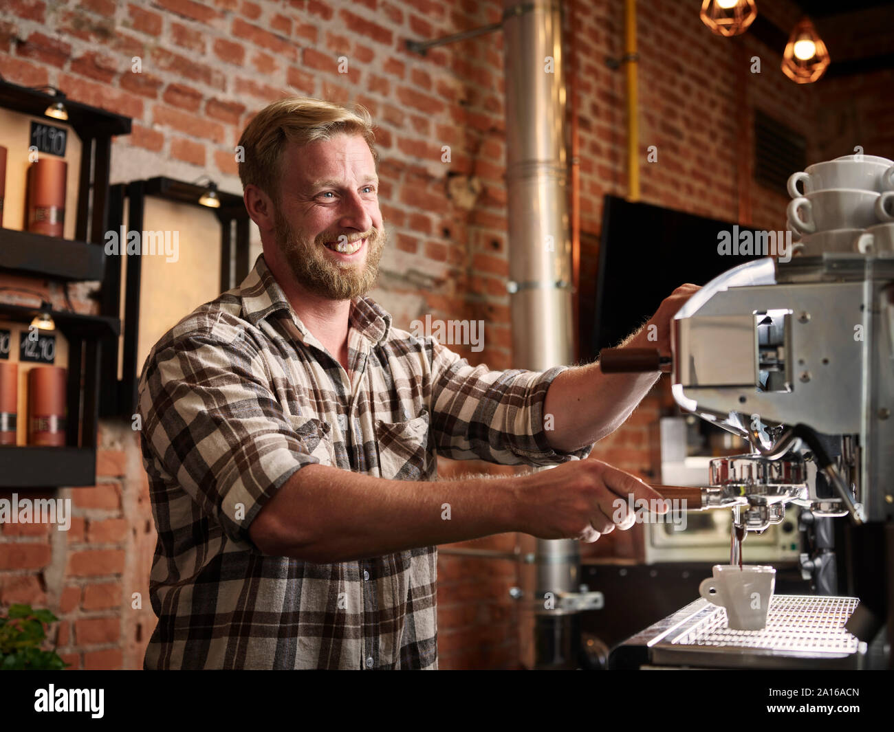 Man preparing espresso in a cafe Stock Photo