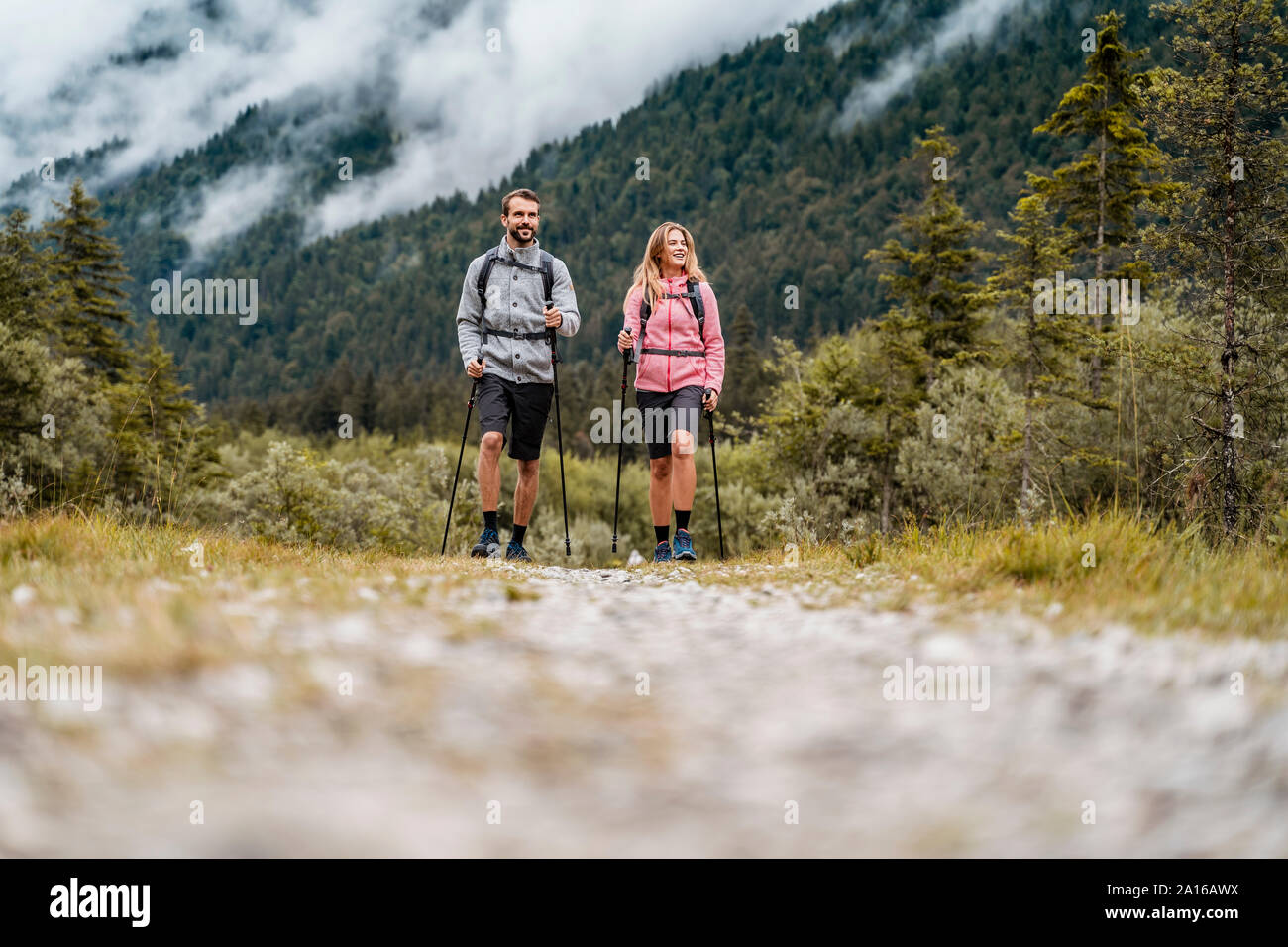 Young couple on a hiking trip, Vorderriss, Bavaria, Germany Stock Photo