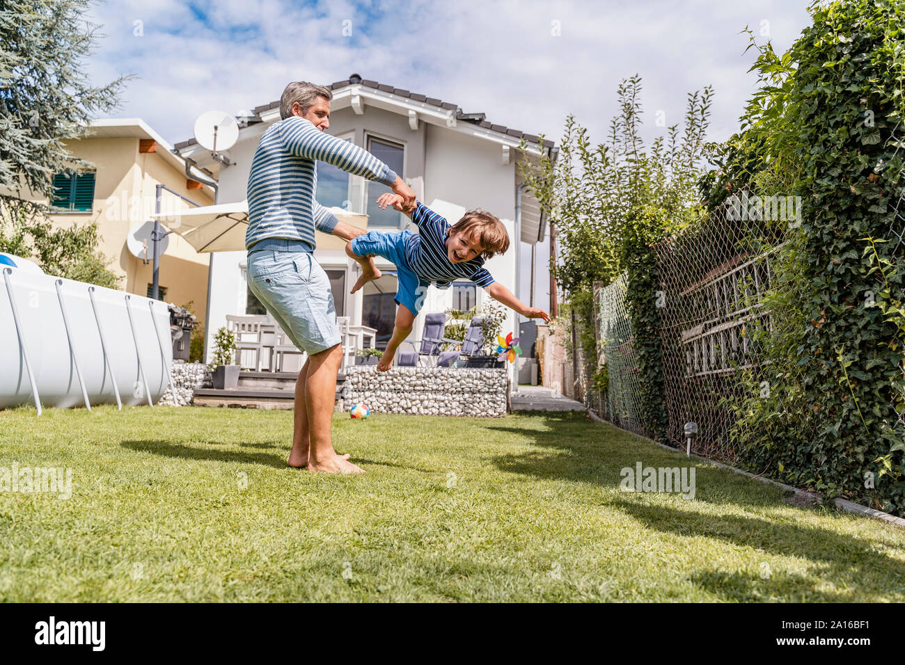 Joyful father son bonding hi-res stock photography and images - Alamy