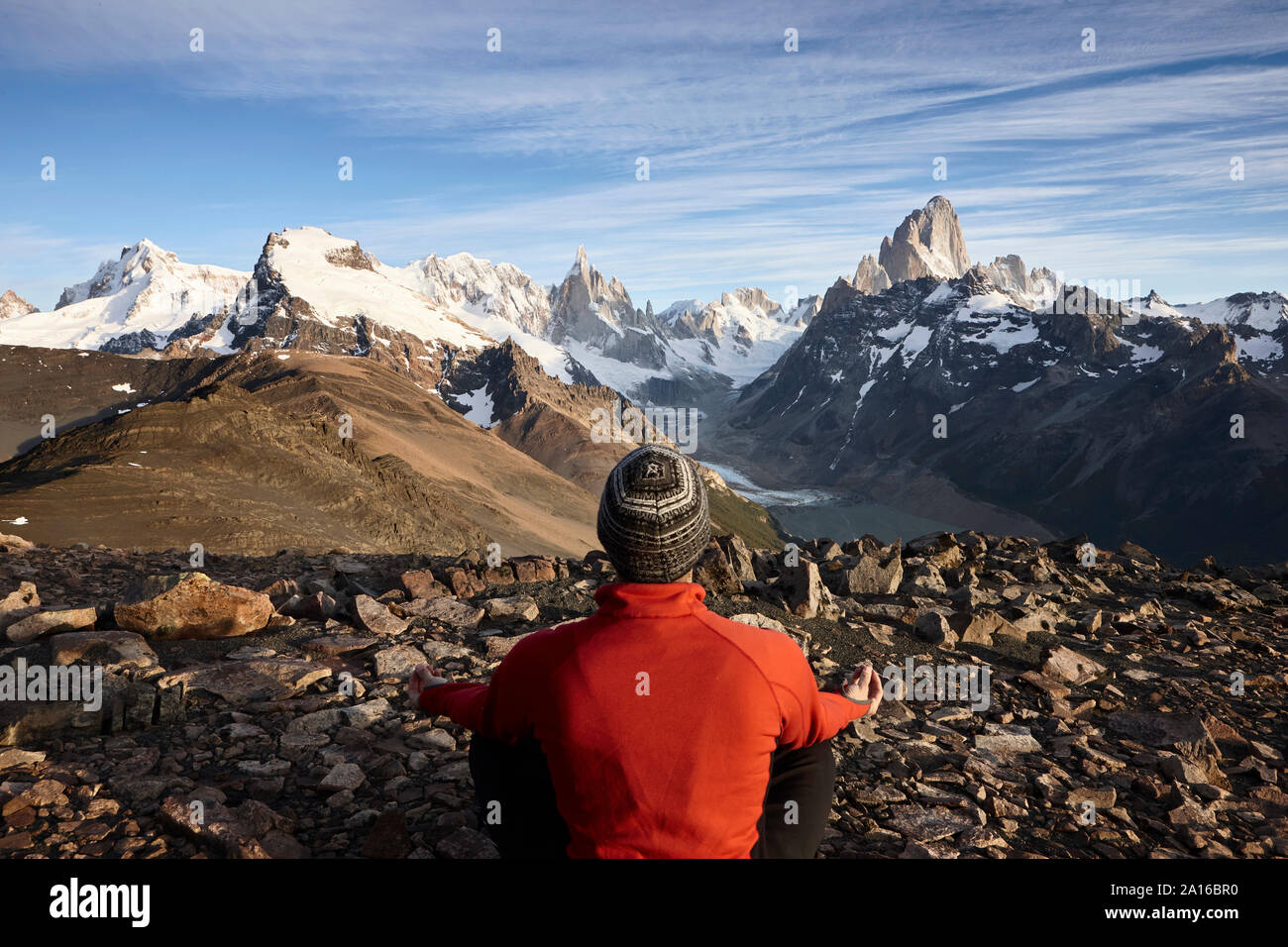 Man looking at Fitz Roy and Cerro Torre mountains, Los Glaciares National Park, Patagonia, Argentina Stock Photo