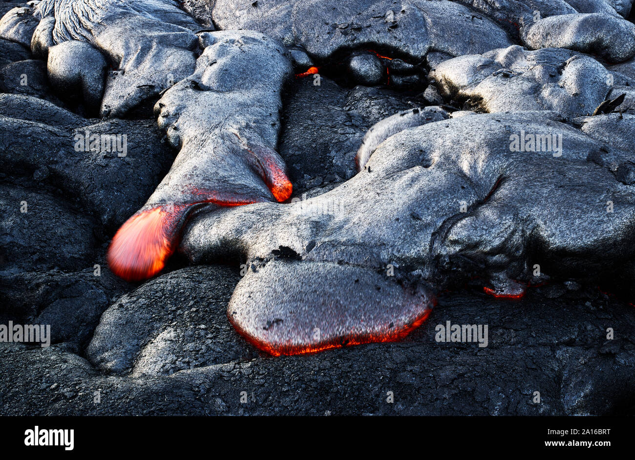 High angle view of lava flowing from Pu'u O'o' at Hawaii Volcanoes National Park Stock Photo