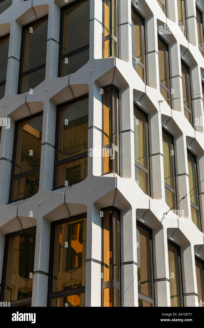 Tinted glass windows of office building in Lucerne Stock Photo